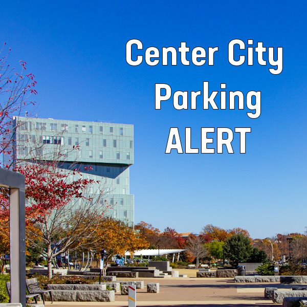 Photo of Center City building with parking alert text