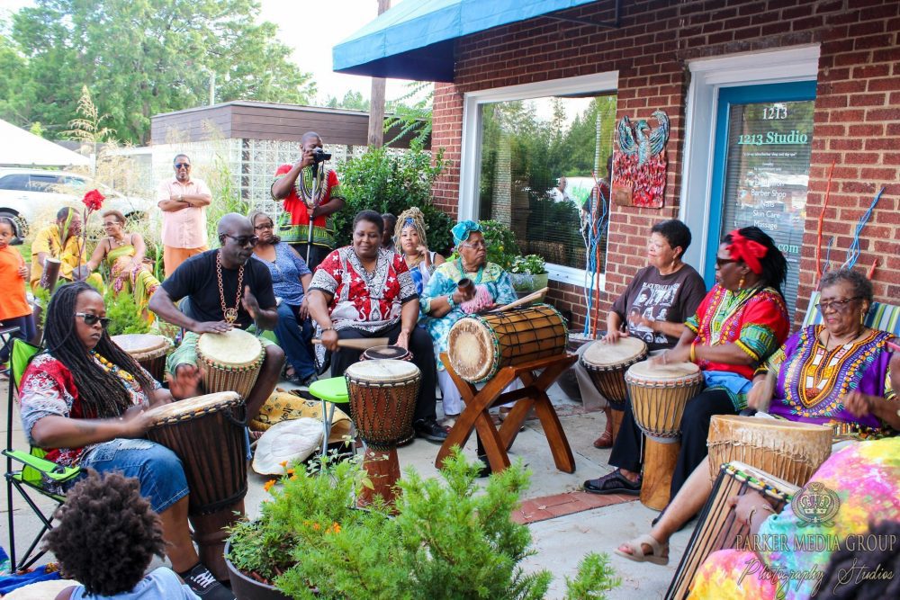 community members play in a drum circle at Juneteenth Festival of the Carolinas in 2024
