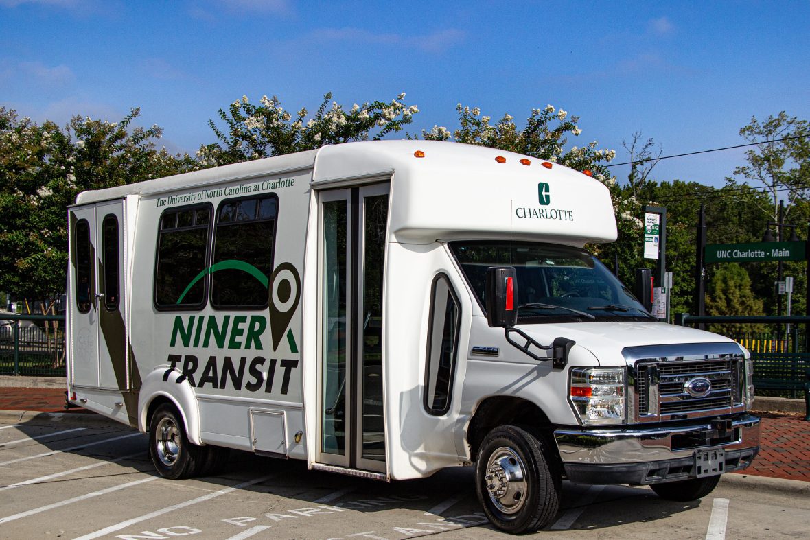 Niner transit shuttle parked in bus pull-off