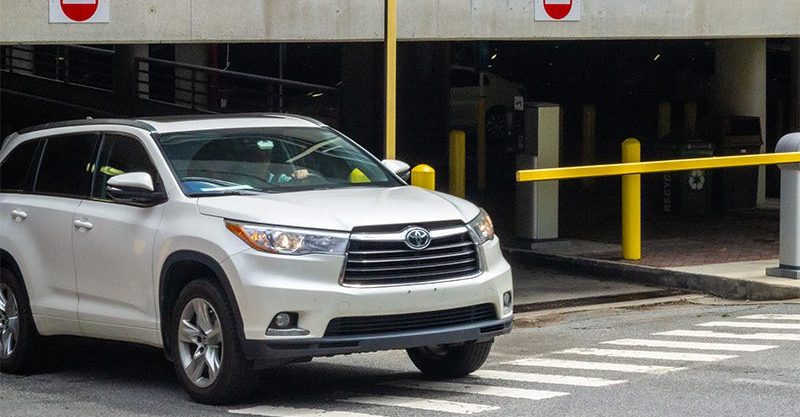 car exiting a parking deck