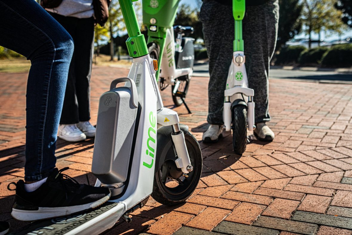 Close up of Lime e-scooters.