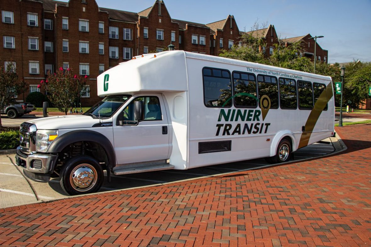 Medium shuttle bus with Niner Transit logo